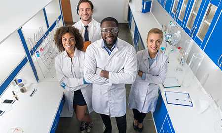 People smiling in science lab