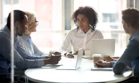 People sitting and talking at a table