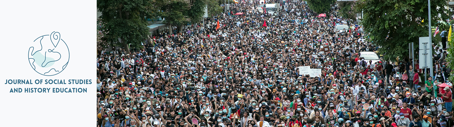 A large crowd of masked protestors.